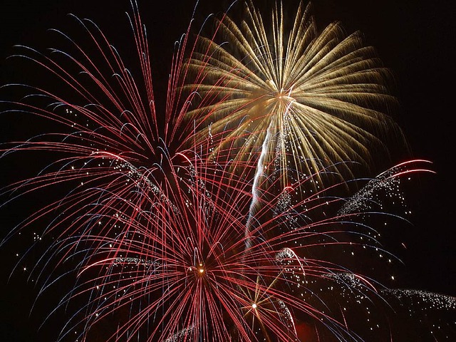 Fireworks explode in the night sky in Jackson Hole, WY