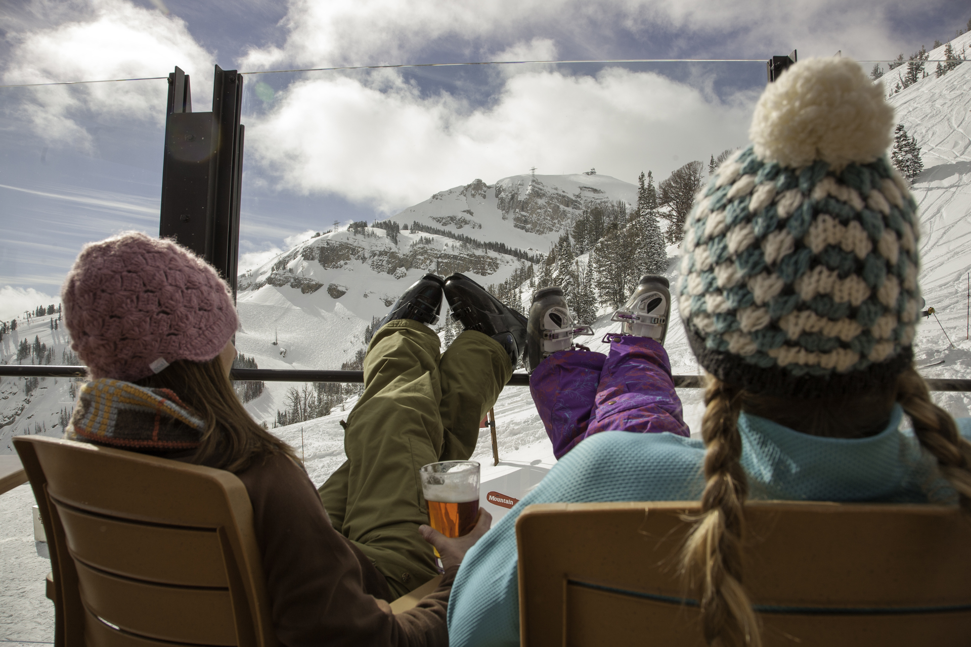 girls drinking beer on mountain